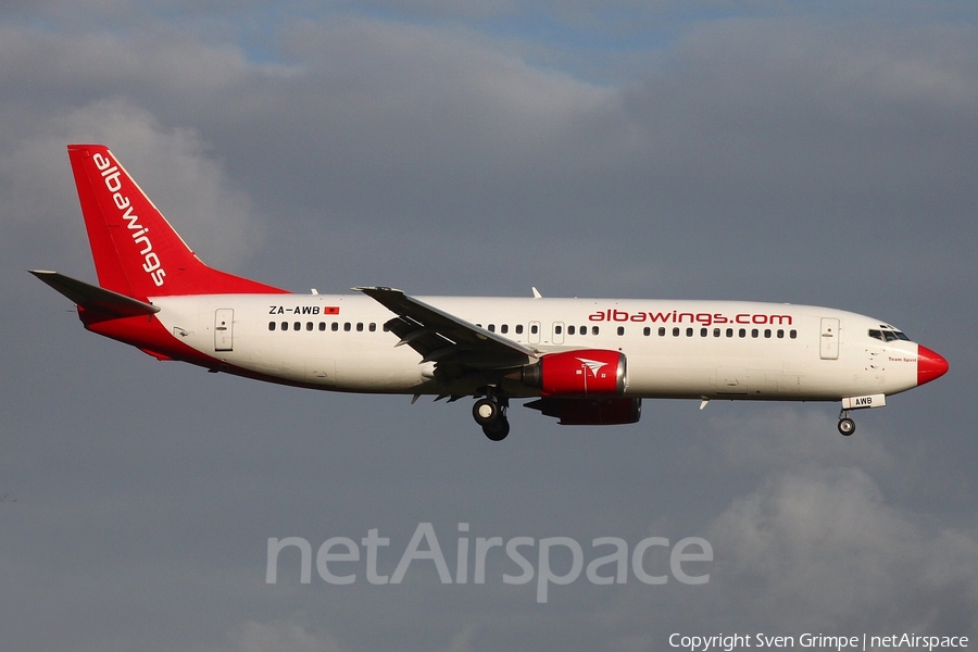 Albawings Boeing 737-408 (ZA-AWB) | Photo 393396